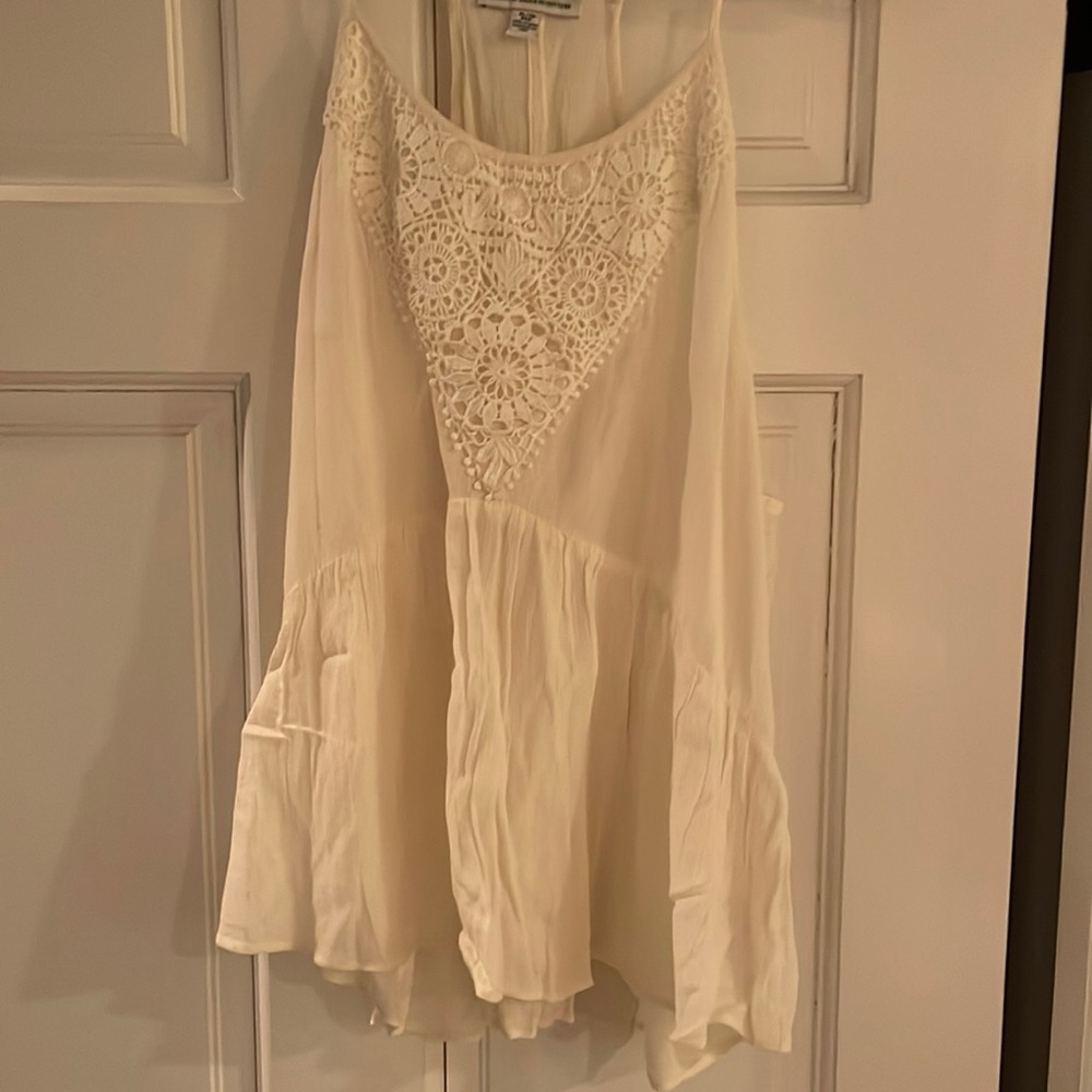 Cream razorback tank from American eagle, mesh design at neck
